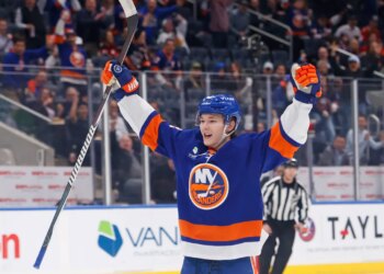 New York Islanders defenseman Matthew Schaefer (48) reacts to a goal by New York Islanders left wing Anders Lee (27) during the first period when the New York Islanders played the Chicago Blackhawks Tuesday, March 24, 2026 at UBS Arena in Elmont, NY.