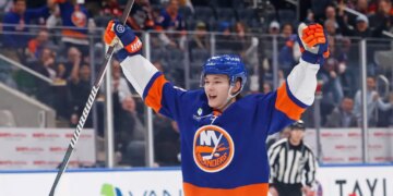 New York Islanders defenseman Matthew Schaefer (48) reacts to a goal by New York Islanders left wing Anders Lee (27) during the first period when the New York Islanders played the Chicago Blackhawks Tuesday, March 24, 2026 at UBS Arena in Elmont, NY.