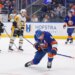 New York Islanders player Ryan Pulock reacts after scoring a goal against the Pittsburgh Penguins.
