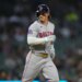 Boston Red Sox's Jarren Duran looking to his bench after walking against the Detroit Tigers.