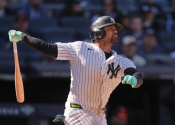 Jasson Domínguez of the New York Yankees looks on after hitting a two-run home run.