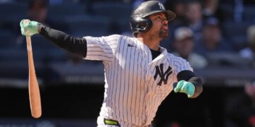 Jasson Domínguez of the New York Yankees looks on after hitting a two-run home run.