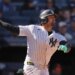 Jasson Domínguez of the New York Yankees looks on after hitting a two-run home run.