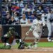New York Yankees second baseman Jazz Chisholm Jr. (13) hits a two-run RBI double during the third inning during the Subway Series at Citi field in the Queens, New York, USA, Friday, May 15, 2026.