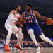 Knicks center Karl-Anthony Towns (32) defends the 76ers' Joel Embiid (21) during Game 1 of the second round on May 4, 2026.