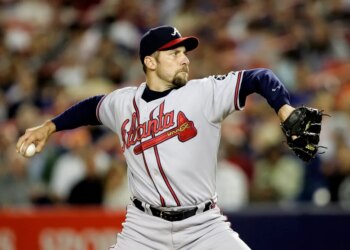 Atlanta Braves pitcher John Smoltz mid-pitch.