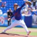 New York Mets pitcher Jonah Tong throws a pitch during spring training.