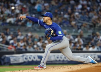 Toronto Blue Jays pitcher José Berríos throws a pitch during the second inning against the New York Yankees at Yankee Stadium in the Bronx, New York, USA, Friday, March 25, 2025.