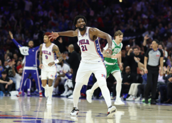 Philadelphia 76ers center Joel Embiid reacts after a three-pointer against the Boston Celtics.