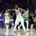 Philadelphia 76ers center Joel Embiid reacts after a three-pointer against the Boston Celtics.