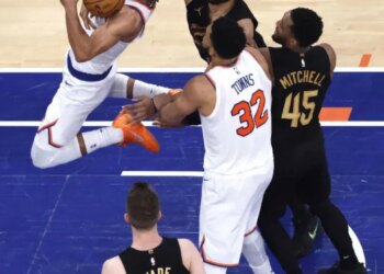 Josh Hart looks like he was fouled by center Jarrett Allen (31) center Karl-Anthony Towns fouled Allen canceling the foul call on Allen during the third quarter of the Knicks' 115-104 comeback overtime win over the Cavaliers in Game 1 on May 19, 2026 at the Garden.