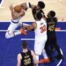 Josh Hart looks like he was fouled by center Jarrett Allen (31) center Karl-Anthony Towns fouled Allen canceling the foul call on Allen during the third quarter of the Knicks' 115-104 comeback overtime win over the Cavaliers in Game 1 on May 19, 2026 at the Garden.