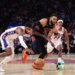 Philadelphia 76ers player Paul George steals the ball from New York Knicks player Karl-Anthony Towns during Game 2 of the Eastern Conference Semifinals.