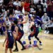 New York Knicks center Karl-Anthony Towns (32) looks for the open man as Cleveland Cavaliers forward Dean Wade (32) defends during the second quarter.