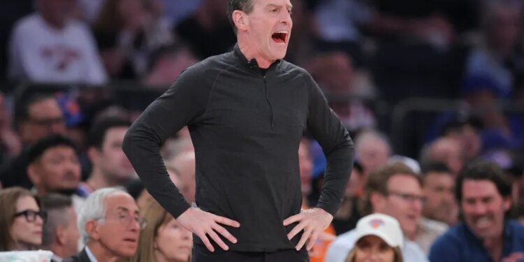 Cleveland Cavaliers head coach Kenny Atkinson yelling during a game.