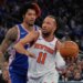 Jalen Brunson is defended by Kelly Oubre Jr. during the Knicks' Game 1 blowout win over the 76ers on May 4, 2026 at the Garden.