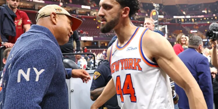 Landry Shamet celebrates with Knicks great John Starks after their 121-108 Game 3 win over the Cavaliers on May 23, 2026 in Cleveland.