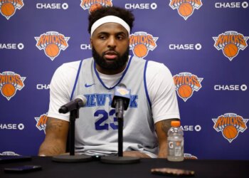 Mitchell Robinson speaking at a press conference after New York Knicks practice.