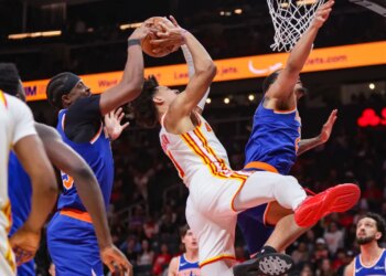Ariel Hukporti (left) blocks Jalen Johnson's shot during the fourth quarter of the Knicks' 140-89 Game 6 series-clinching win over the Hawks on April 30, 2026 in Atlanta.