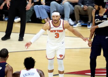 New York Knicks guard Josh Hart reacts on the court.