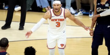 New York Knicks guard Josh Hart reacts on the court.