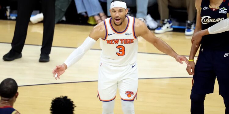 New York Knicks guard Josh Hart reacts on the court.