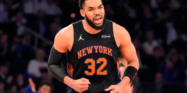 New York Knicks center Karl-Anthony Towns reacts during the second half of Game 2 in a second-round NBA basketball playoffs series against the Philadelphia 76ers, Wednesday, May 6, 2026, in New York.