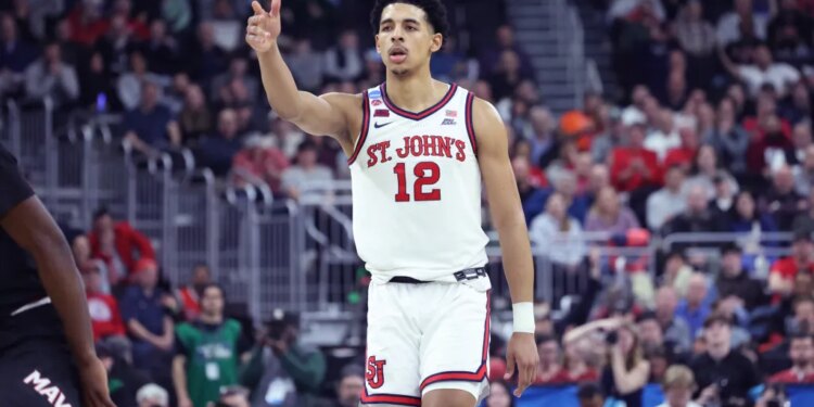 St. John's Red Storm guard RJ Luis Jr. reacting after a 3-point shot.
