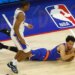 New York Knicks guard Landry Shamet (44) falls with the ball as Philadelphia 76ers guard Tyrese Maxey (0) gives chase during the second quarter.