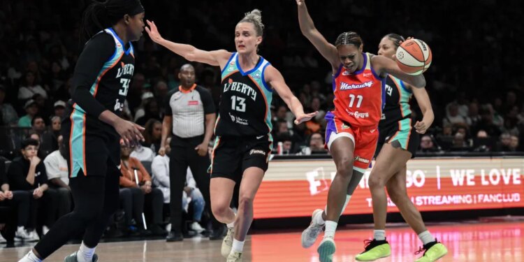 Leonie Fiebich (13) defends Marta Suarez (right) during the Liberty's 84-74 win over the Mercury on May 27, 2026 at Barclays Center.