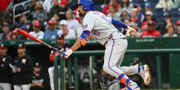 Mets second baseman Marcus Semien (10) singles against the Washington Nationals during the ninth inning at Nationals Park.