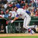 Mets second baseman Marcus Semien (10) singles against the Washington Nationals during the ninth inning at Nationals Park.