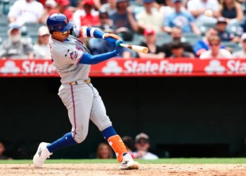 Mark Vientos of the New York Mets hitting a home run.