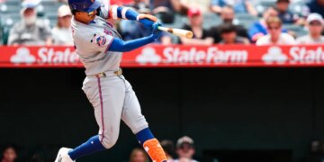 Mark Vientos of the New York Mets hitting a home run.