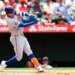 Mark Vientos of the New York Mets hitting a home run.