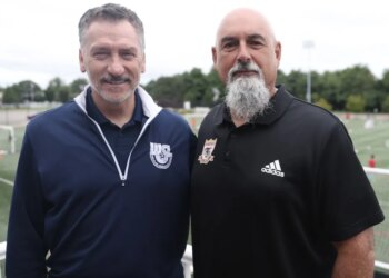 Massapequa Soccer Club director Paul Bigilin (right) with Wrexham FC's John Fitzgerald in 2025.