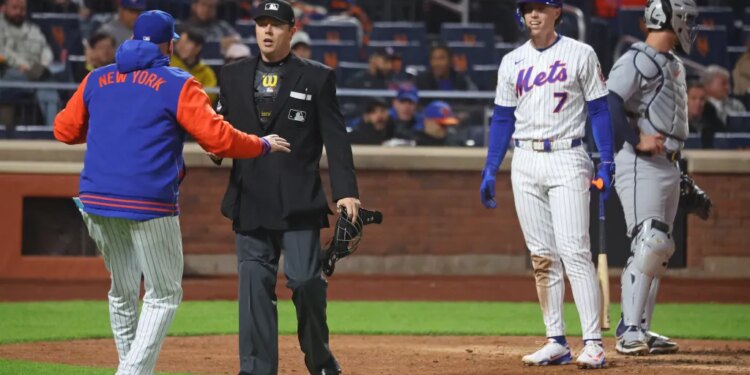 New York Mets manager Carlos Mendoza (64) and New York Mets right fielder Brett Baty (7) argue the use of a ABS call during the sixth inning when the New York Mets played the Detroit Tigers on Wednesday, May 13, 2026 at Citi Field in Queens, NY.