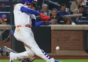 New York Mets left fielder Juan Soto (22) fouls a ball off his right foot.on a swing during the third inning when the New York Mets played the Detroit Tigers Wednesday, May 13, 2026 at Citi Field in Queens, NY.