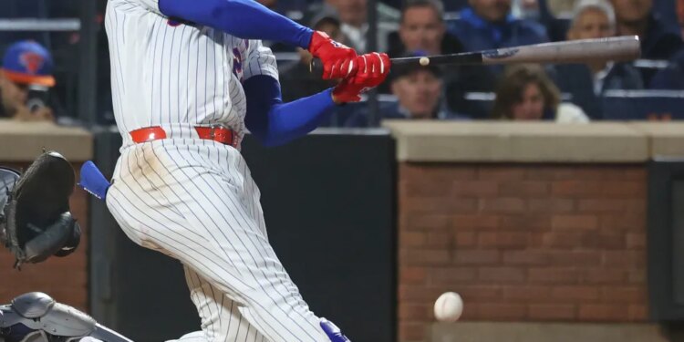 New York Mets left fielder Juan Soto (22) fouls a ball off his right foot.on a swing during the third inning when the New York Mets played the Detroit Tigers Wednesday, May 13, 2026 at Citi Field in Queens, NY.