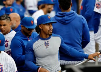 New York Mets player Francisco Lindor in the dugout.