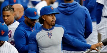 New York Mets player Francisco Lindor in the dugout.