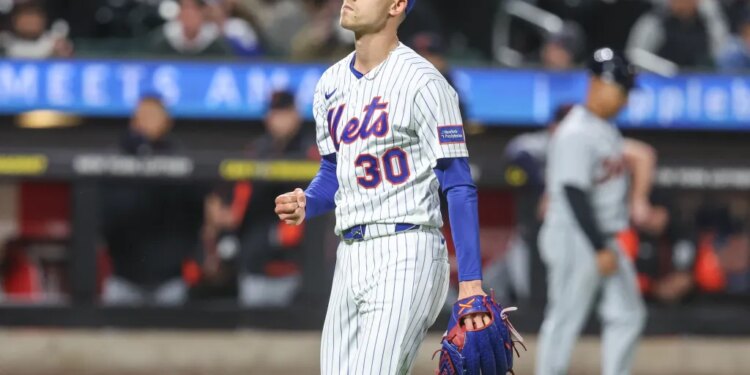 New York Mets relief pitcher Luke Weaver (30) gestures after retiring the side in the eighth inning against the