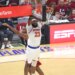 New York Knicks center Mitchell Robinson (23) slams the ball during the third quarter.