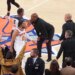 New York Knicks head coach Mike Brown speaking to the ref at the end of the 4th quarter.