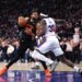 New York Knicks center Karl-Anthony Towns #32 drives to the basket as Philadelphia 76ers center Adem Bona #30 gives chase during the third quarter.