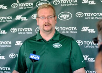 Jets general manager Mike Maccagnan speaks to the media at training camp.