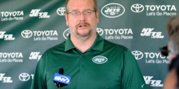 Jets general manager Mike Maccagnan speaks to the media at training camp.