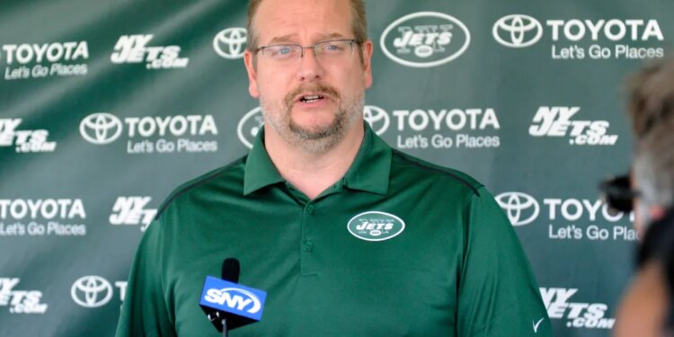 Jets general manager Mike Maccagnan speaks to the media at training camp.