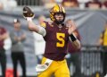 Minnesota quarterback Drake Lindsey (5) throws a pass.