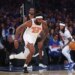 New York Knicks center Mitchell Robinson #23 chasing a loose ball.